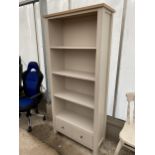 A MODERN OPEN FOUR TIER BOOKCASE WITH TWO CUPBOARDS TO THE BASE, 33" WIDE
