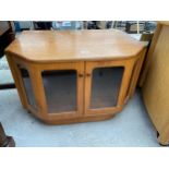 A RETRO TEAK G-PLAN TV CABINET WITH GLASS DOORS