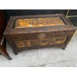 A CARVED CAMPHOR WOOD CHEST, 35" WIDE