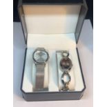 TWO WHITE METAL NEXT WATCHES IN A PRESENTTION BOX BOTH SEEN WORKING BUT NO WARRANTY