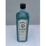 A 1 LITRE BOTTLE OF IMPORTED BOMBAY SAPPHIRE LONDON DRY GIN 47% VOL