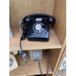 A RETRO BLACK ROTARY DIAL TELEPHONE