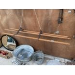 A WOODEN AND METAL CIELING SUSPENDED CLOTHES DRYER
