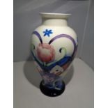 A LARGE TUPTON FLORAL BALUSTER FORM VASE