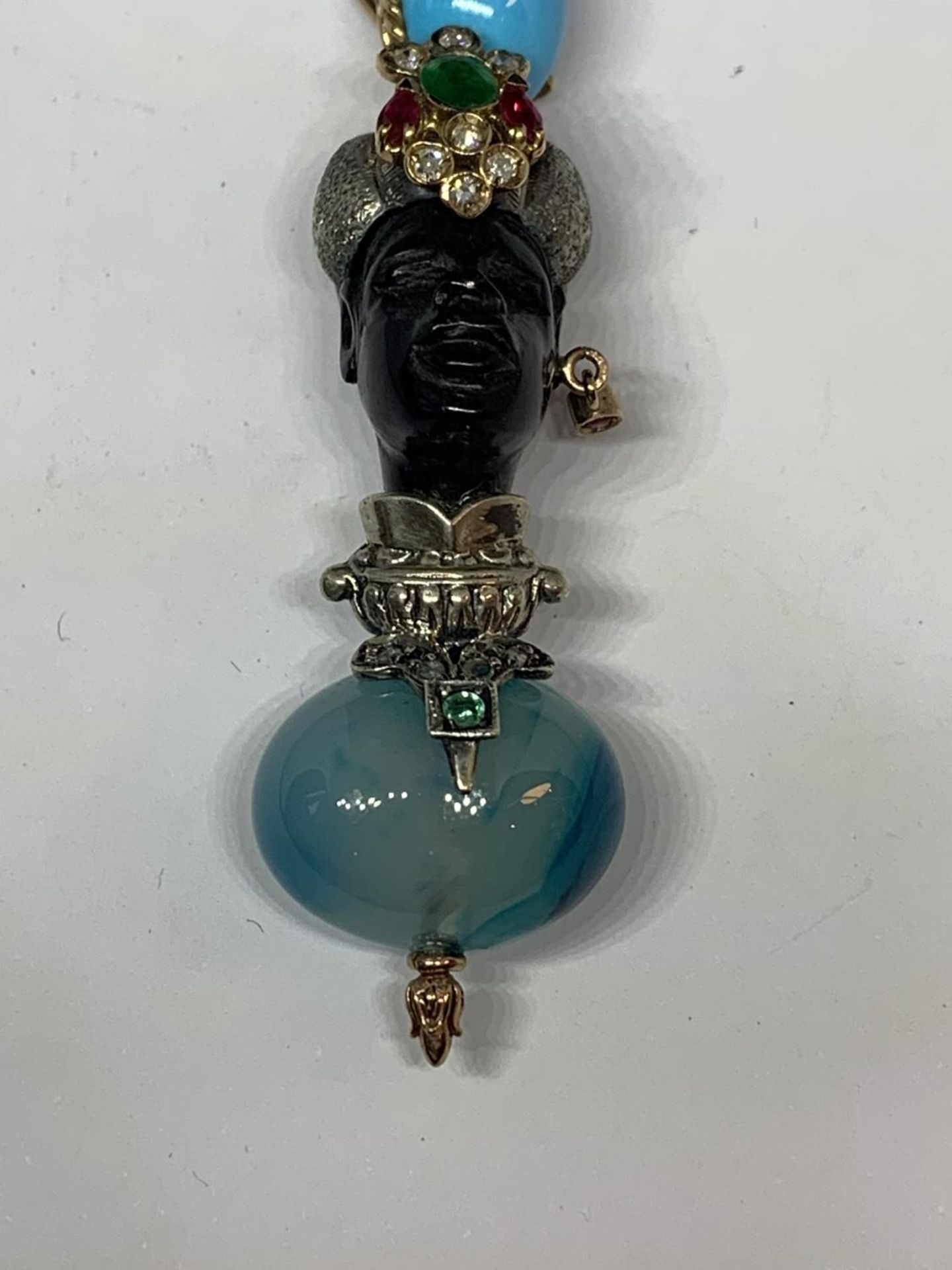 A BLACKAMORE PENDANT OF AN AFRICAN TRIBAL FIGURE WITH RUBYS, EMERALDS AND TURQUOISE STONES BY - Image 3 of 5