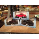 THREE BOXED OXFORD DIE CAST MODELS TO INCLUDE A SCALE 1:43 BLACK JAGUAR, AN AUSTIN RUBY SALOON AND A