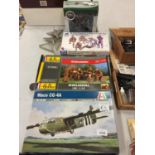 A DIECAST SPITFIRE, THREE MODEL RAF VULCANS , THREE MODEL KITS