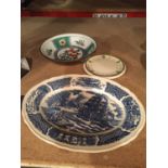 THREE CERAMIC ITEMS TO INCLUDE A PATTERNED BOWL, A ROYAL DOULTON TEAPOT STAND AND A FAIR WINDS