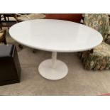 A WHITE CIRULAR DINING TABLE ON METAL BASE BY RYMAN CONTRAN FURNISHING, 45" DIAMETER