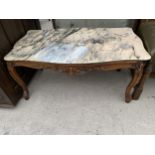 A MARBLE TOP COFFEE TABLE