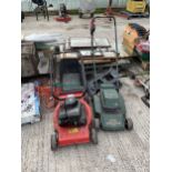 AN ELECTRIC BLACK AND DECKER LAWN MOWER AND A FURTHER PETROL ENGINE LAWN MOWER