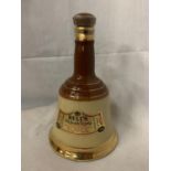A BELL'S OLD SCOTCH WHISKY IN A WADE BELL DECANTER 70% PROOF 75.7CL