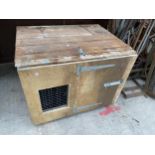 A WOODEN ANIMAL HUTCH