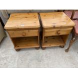 A PAIR OF MODERN PINE BEDSIDE LOCKERS