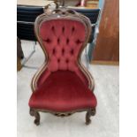 A VICTORIAN STYLE SPOON BACK CHAIR