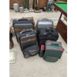 AN ASSORTMENT OF VARIOUS SUITCASES TO INCLUDE TWO BY SCOTTS OF STOW ETC