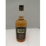 A 1 LITRE BOTTLE OF WHYTE AND MACKAY SCOTCH WHISKY MATURED TWICE EXTRA STRENGTH 52.5% VOLUME