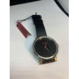 A HUGO BOSS WRIST WATCH SEEN WORKING BUT NO WARRANTY