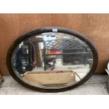 A VINTAGE WOODEN FRAMED MIRROR