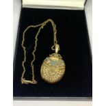 A 9 CARAT GOLD WINDOW LOCKET SET WITH OPALS (GLASS A/F) GROSS WEIGHT 20.6 GRAMS CHAIN LENGTH 46CM