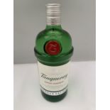 A 1 LITRE BOTTLE OF TANQUERAY EXPORT STRENGTH LONDON DRY GIN