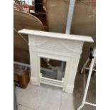 A CREAM PAINTED DECORATIVE CAST IRON FIRE SURROUND