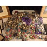 A LARGE QUANTITY OF ACCESSORIES TO INCLUDE CHUNKY BEADED NECKLACES, HAIR SCRUNCHES AND HEADBANDS