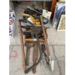 AN ASSORTMENT OF TOOLS TO INCLUDE A BOW SAW, TROWELS AND SHEARS ETC
