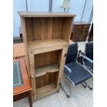 A VICTORIAN PINE CUPBOARD WITH SINGLE DOOR (LACKING GLASS)