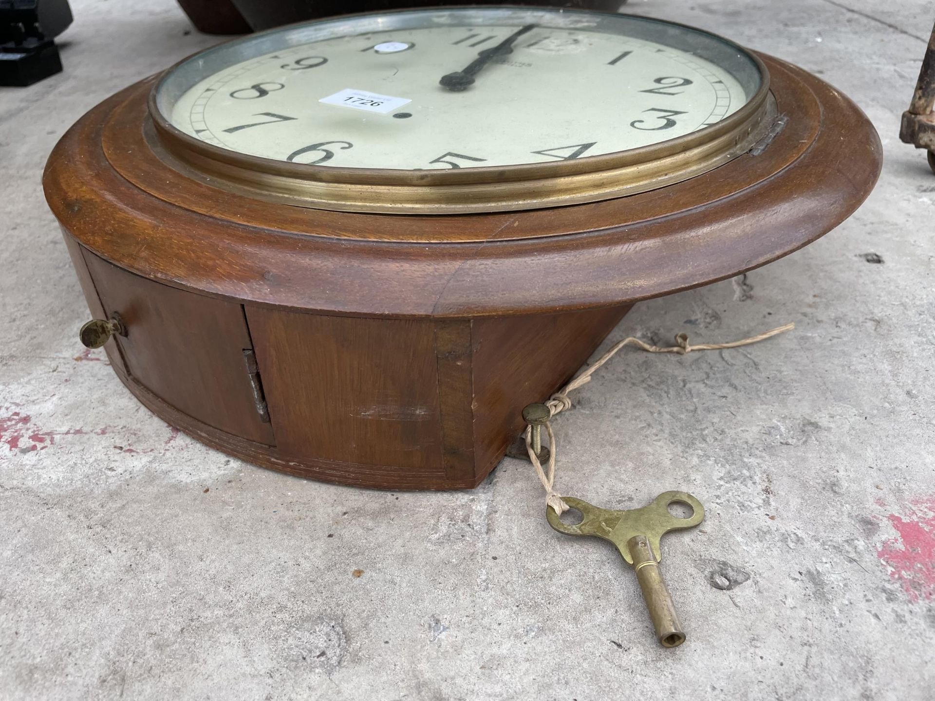 A WOODEN CASED CIRCULAR WALL CLOCK - Image 2 of 2