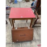 A FORMICA TOP DROP-LEAF TABLE AND SUITCASE