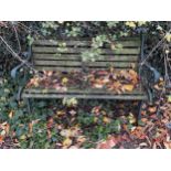 A SLATTED GARDEN BENCH WITH CAST ENDS (L:129CM)