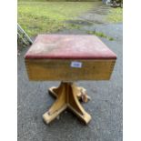 A REVOLVING STORAGE STOOL