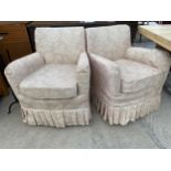 A PAIR OF SMALL UPHOLSTERED EASY CHAIRS