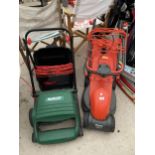 AN ELECTRIC FLYMO LAWNMOWER AND A QUALCAST LAWN RAKE