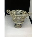 A TESTED TO SILVER DECORATIVE DISH WITH WEIGHTED BASE GROSS WEIGHT 281.1 GRAMS