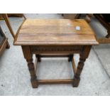 A REPRODUCTION OAK STOOL IN GEORGIAN STYLE