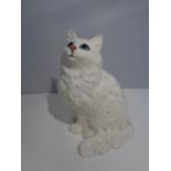 A BESWICK WHITE CAT FIGURE