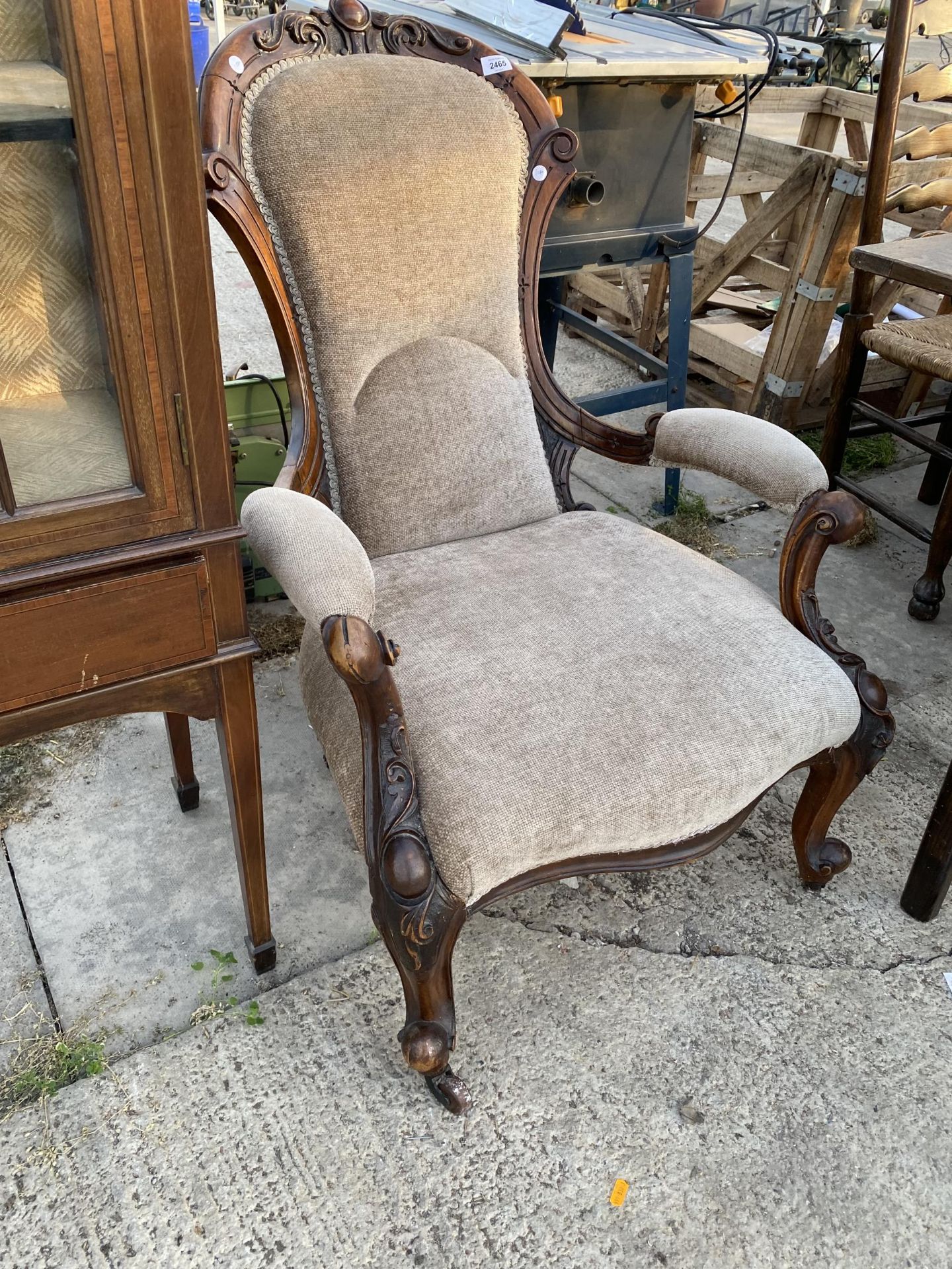 A VICTORIAN WALNUT FIRESIDE CHAIR WITH OPEN ARMS, ON CABRIOLE LEGS - Image 3 of 3