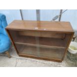 A RETRO TEAK BOOKCASE WITH GLASS SLIDING DOORS, 37" WIDE