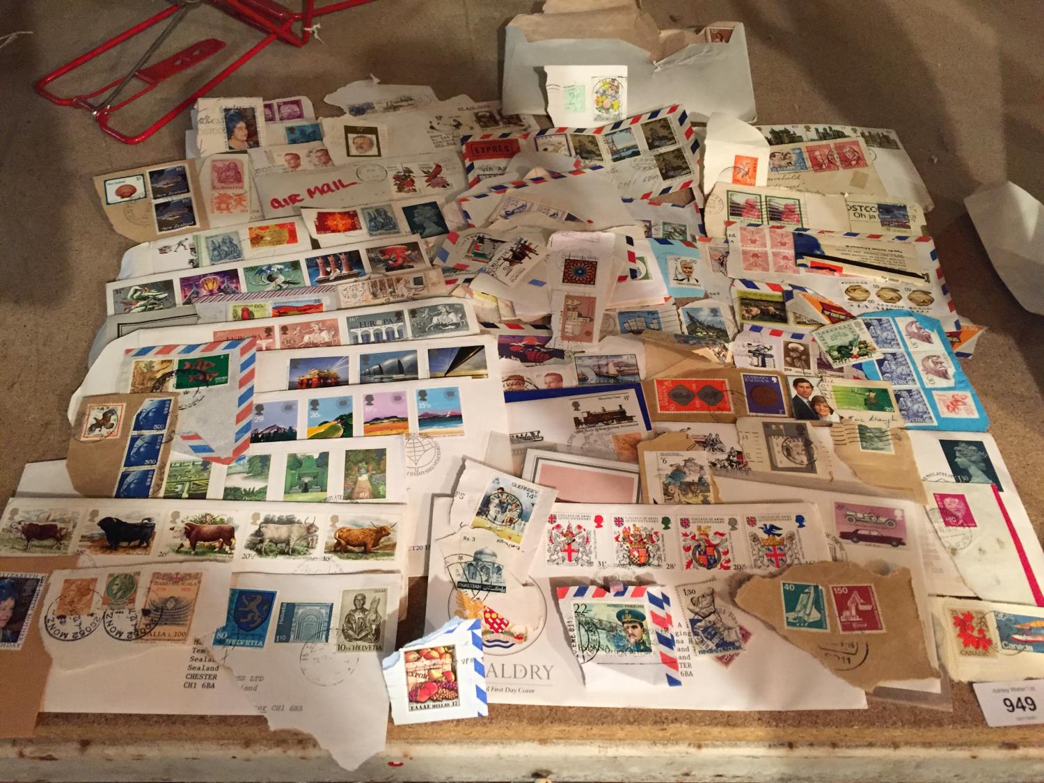 A QUANTITY OF FIRST DAY COVERS AND LOOSE STAMPS