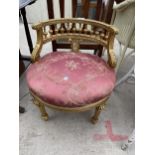 A 19TH CENTURY GILT BEDROOM CHAIR, ON TURNED AND FLUTED LEGS, BEARING EMBOSSED LABEL 'HASSLEWOOD,