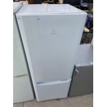 A WHITE INDESIT UPRIGHT FRIDGE FREEZER