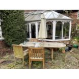 A TEAK GARDEN FURNITURE SET WITH PARASOL