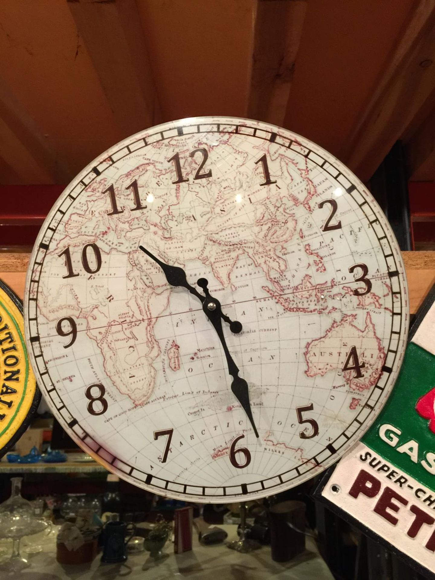 A GLASS FRONTED GLOBE/MAP STYLE WALL CLOCK - Image 2 of 2