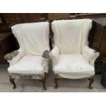 A PAIR OF PARKER KNOLL STYLE WINGED CHAIRS