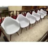 A SET OF SIX EIFFEL STYLE TUB CHAIRS