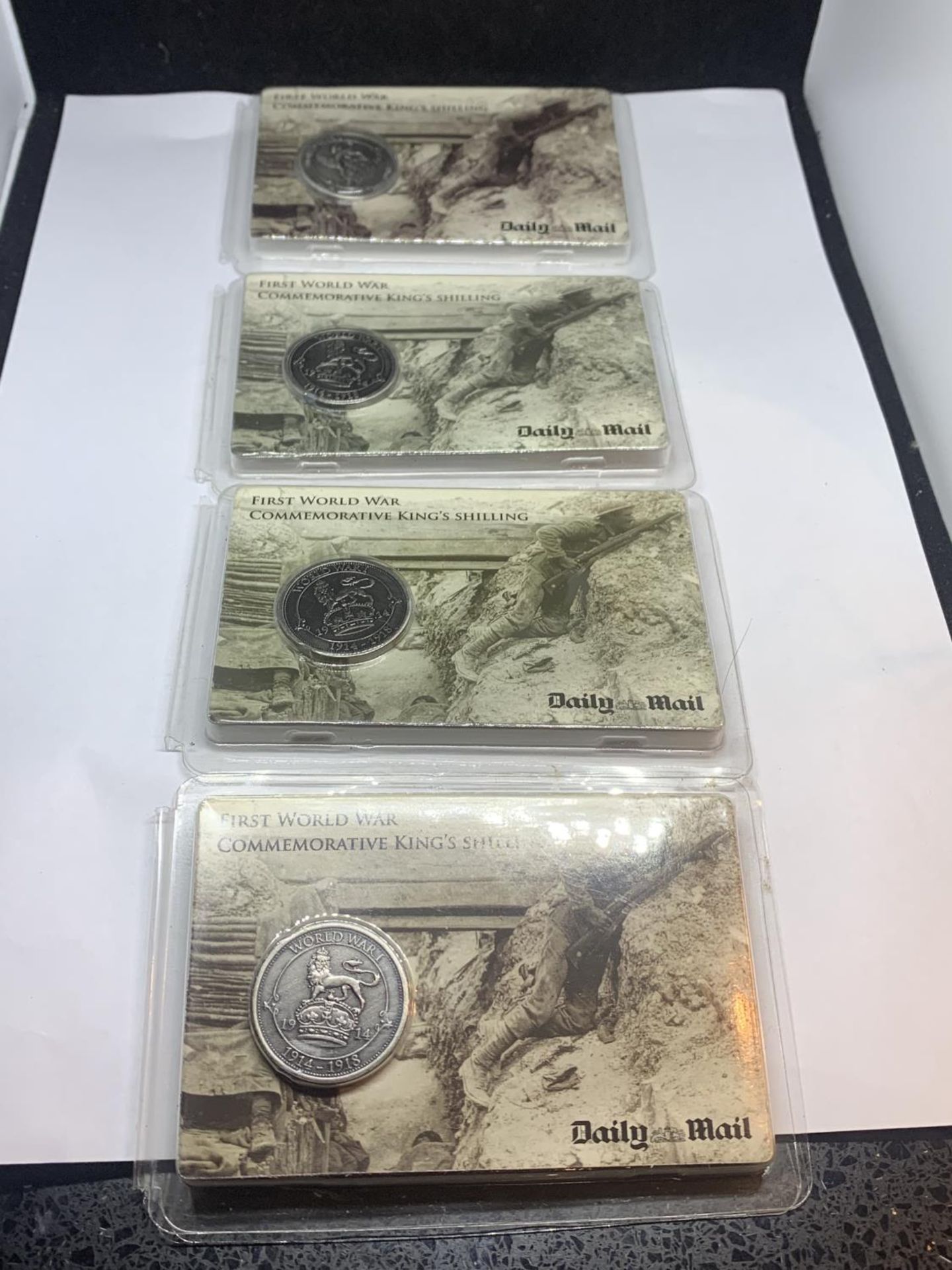 FOUR SILVER PROOF FIRST WORLD WAR COMMEMORATIVE KING'S SHILLINGS