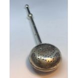 A VINTAGE SILVER PLATED TEA STRAINER