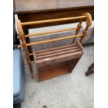 A FIVE BAR TOWEL RAIL AND MAGAZINE RACK